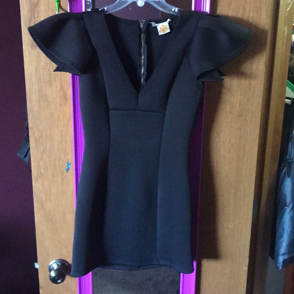 Black Tight dress with a low cut neck